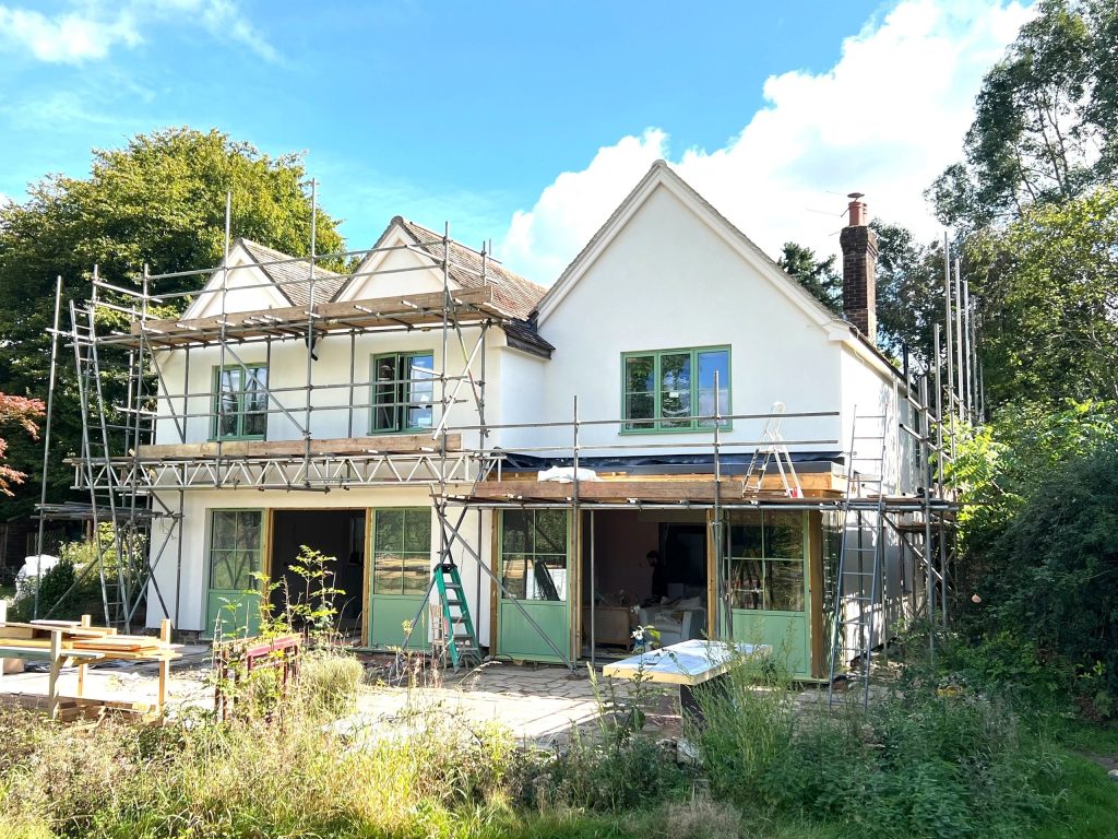 Same property finished with white silicone render